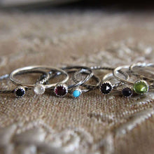 Load image into Gallery viewer, Set of 5 Gemstone Stackable Rings in Sterling Silver on a textured fabric background