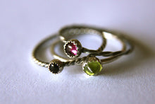 Load image into Gallery viewer, A set of three stackable silver rings, with different colored gemstones.