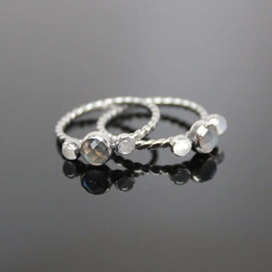 Triple gemstone stacking band. Three gemstones on a textured ring in sterling silver.